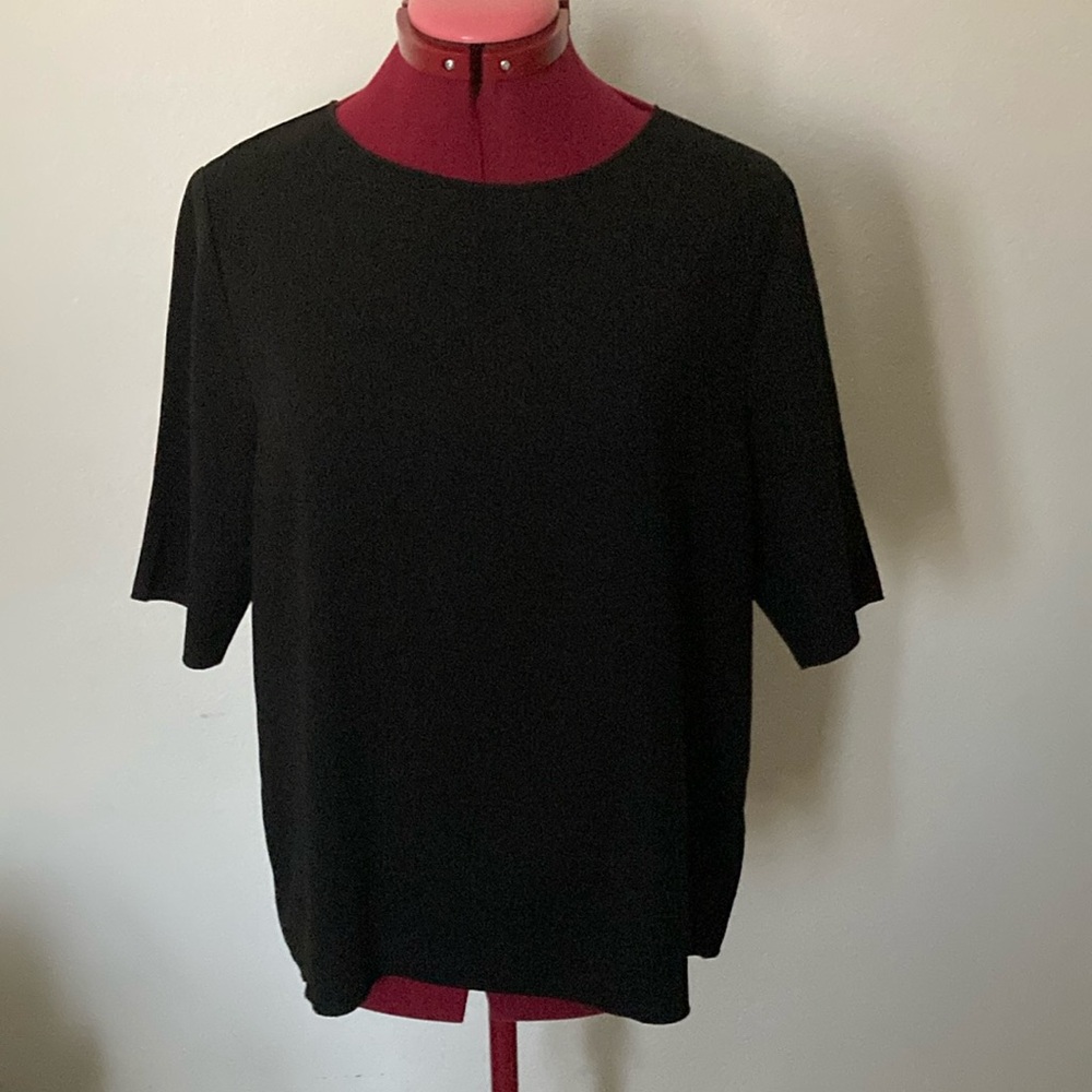 Banana Republic Medium Classic Black Top. Raw edges on neckline sleeves & hem.